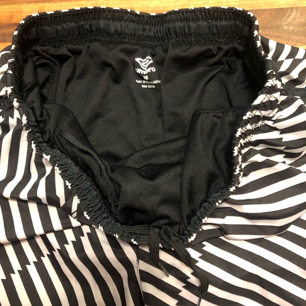 Black and white striped Umbro brand shorts. Size medium . - Picture 5 of 6